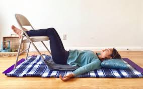 Legs on Chair Pose helps decrease the pressure on your lower back thus relieving lower back pain.